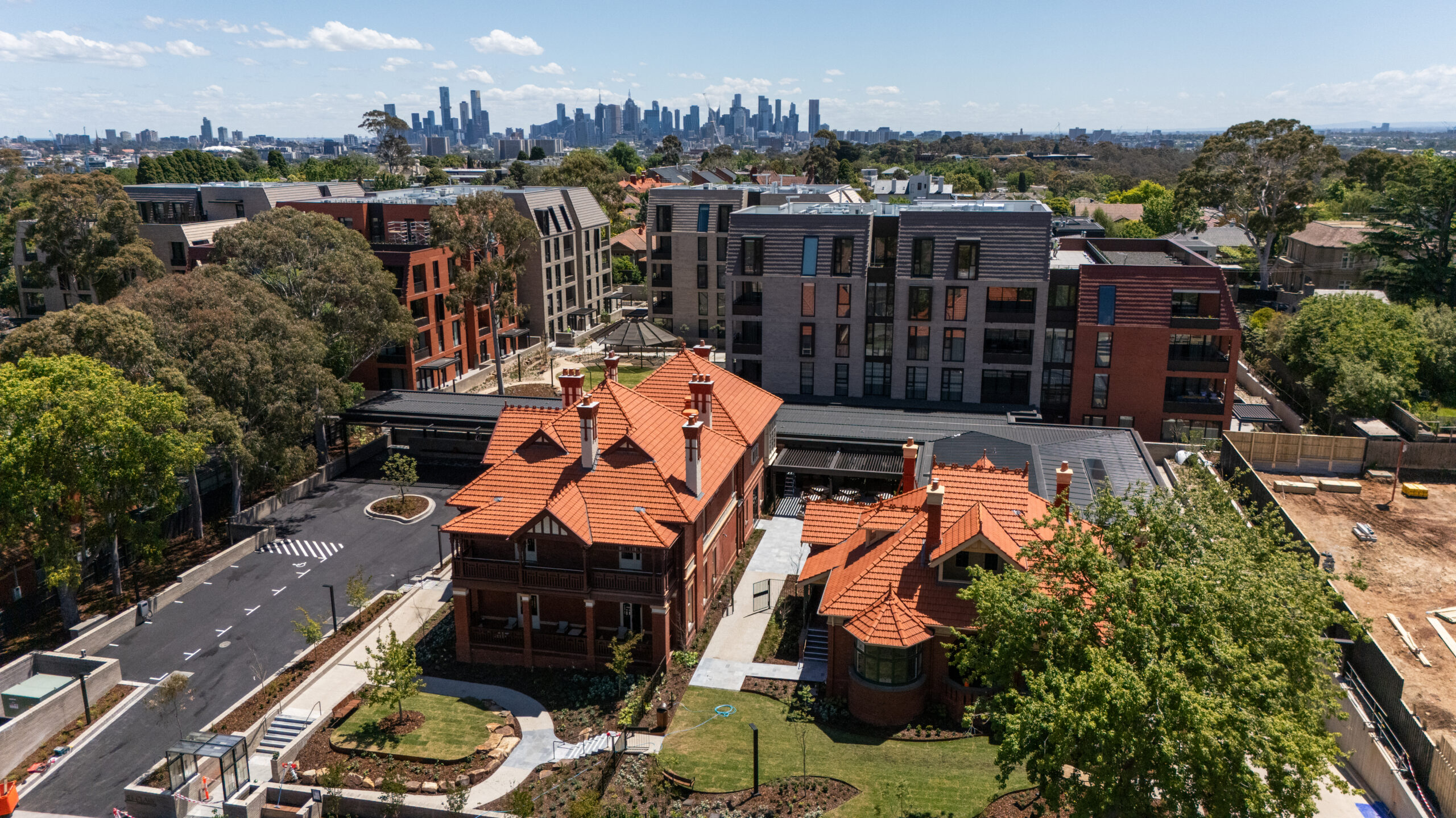 St. Clare retirement precinct showing heritage mansions and new apartment buildings in Kew. Expert carpentry and feature cladding installation by Casello.